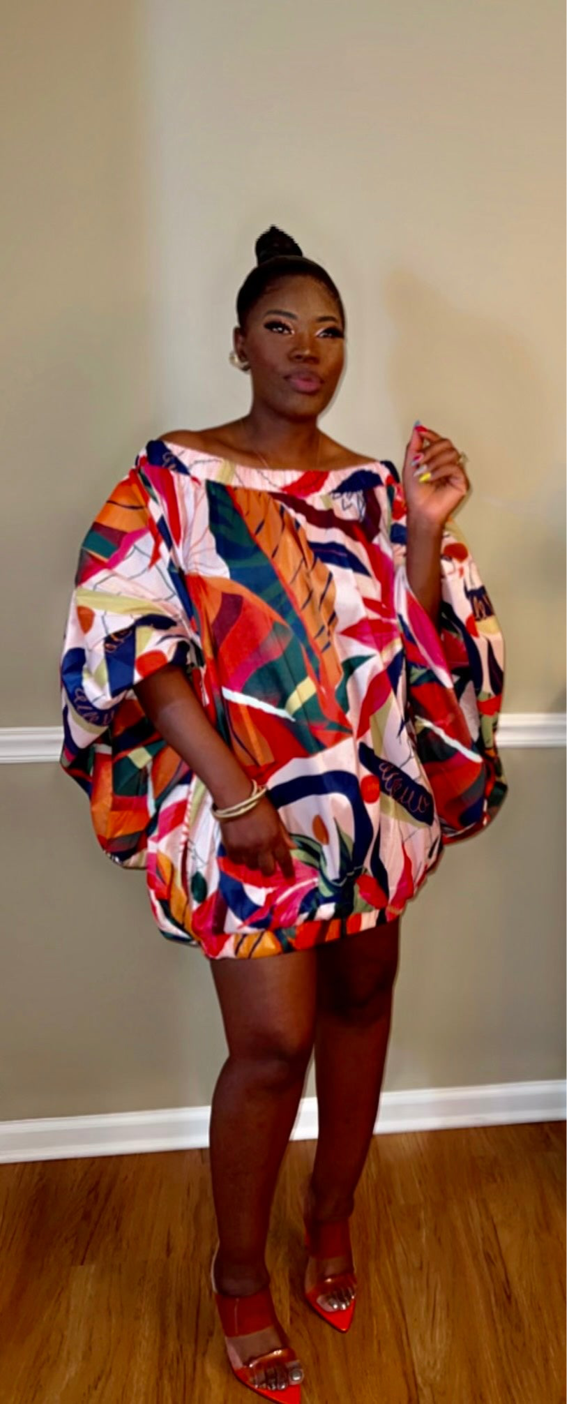 Close-up of the off-the-shoulder design and crisp shirt fabric.