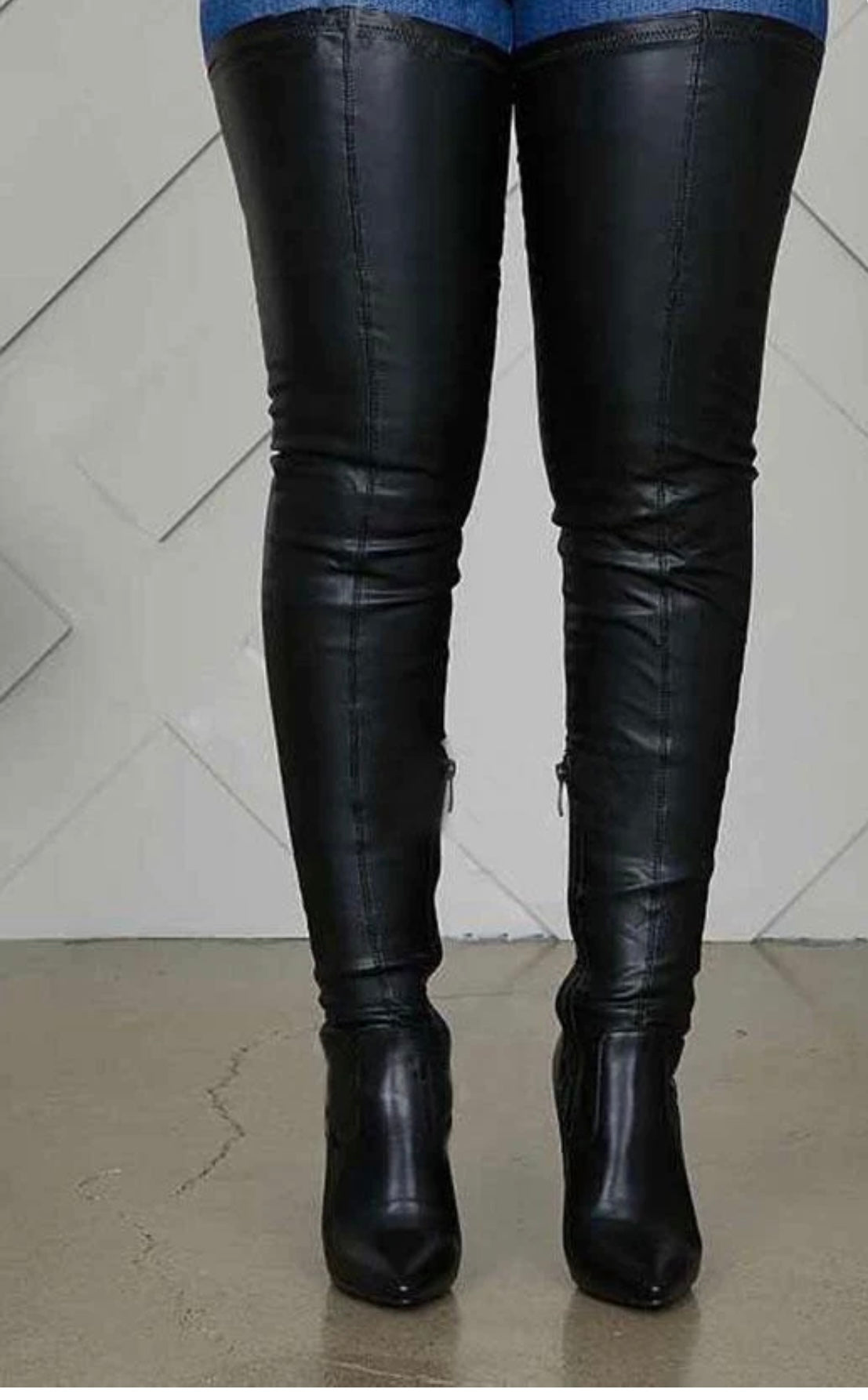 Black over the knee boots for women, featuring a sleek and timeless design