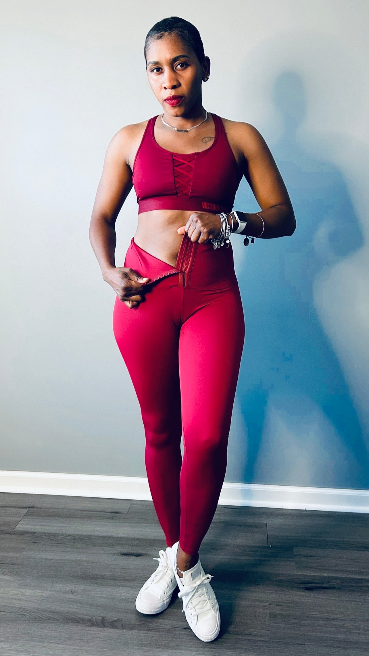 Model wearing high waist shapewear leggings in red color with a sleek and supportive fit.