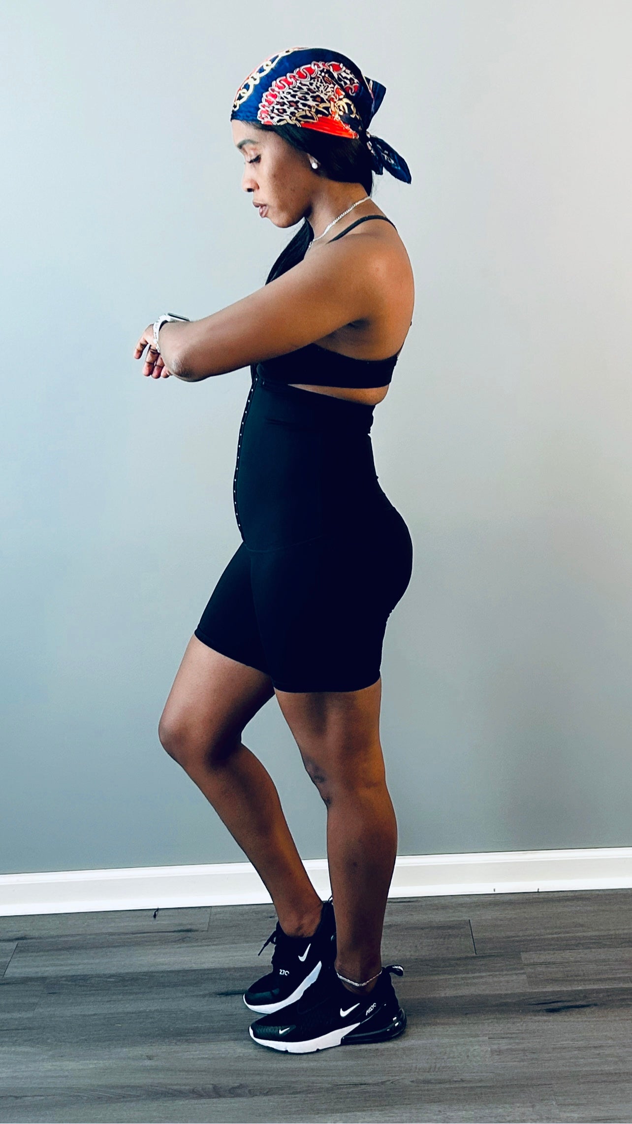 Side profile of waist trainer shorts highlighting the shaping fit for short torsos.